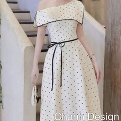 Đầm thiết kế lệch vai chấm bi nơ eo dáng dài