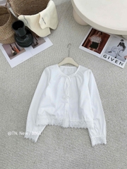 Áo kiểu  thô cổ tròn buộc nơ ren gấu chân áo