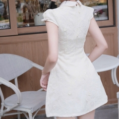 Đầm cổ sen chữ A cúc bọc tay cộc