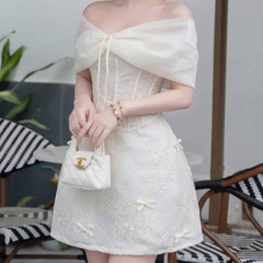 Đầm thiết kế trễ vai nơ ngực