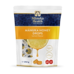 KẸO NGẬM MẬT ONG MANUKA Health Honey Lozenges VỊ LÝ CHUA ĐEN (Blackcurrant), CHANH, GỪNG, KEO ONG (Propolis), 65g (15v)