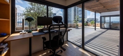 Cải tạo hai căn hộ thành không gian thông tầng 310m² ngập nắng tại Sài Gòn