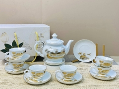 Bộ ấm chén in cảnh vàng kim