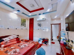 Nhà đường Nguyễn Văn Yến số cũ Phan Anh Ôtô đậu trước cửa nhà.