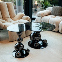 Rivius Orbion – Bàn Tròn Mặt Kính Chân Cầu Điêu Khắc Đen Bóng