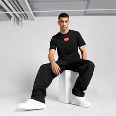 Áo Phông Puma Chính hãng - Casual F1 ESS Logo Tee - Màu Đen | JapanSport 625920-01