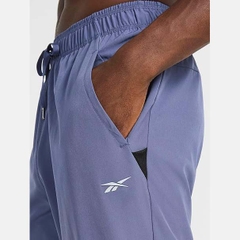 Quần dài Reebok  Chính Hãng -  Travel Jogger Standard Fit 30” Inseam - Màu xanh | Japansport REM233PA25010