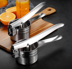 Dụng cụ ép hoa quả cầm tay inox mới có lỗ lược [BH: NONE]