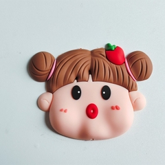 Tượng nhựa dẻo-BABY mập tóc cài trái dâu tây.