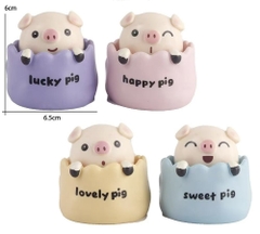 Set 4 tượng heo (lợn) sứ nằm giỏ có lò xo.