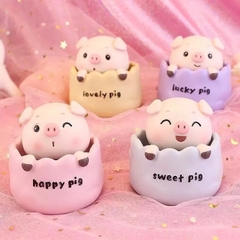 Set 4 tượng heo (lợn) sứ nằm giỏ có lò xo.