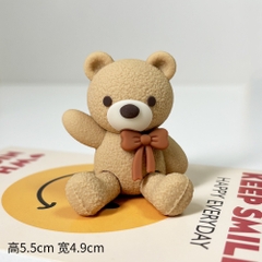 Tượng gấu nâu nhạt-cài nơ màu nâu.