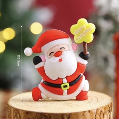 5 tượng nhựa dẻo - ông già noel cầm hoa 5 cánh màu vàng