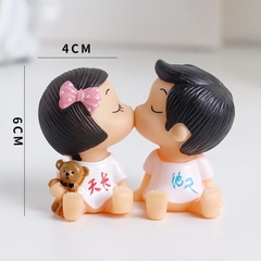 Đôi em bé hôn (baby kiss nhựa).
