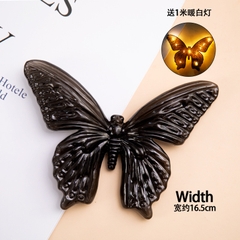 Bướm nhựa ĐEN kèm đèn sáng.