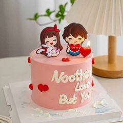 Tượng nhựa dẻo-bé trai ôm trái tim chữ i love you.
