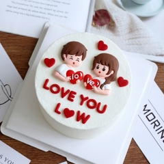 Tượng nhựa dẻo- đôi nam nữ và trái tim đỏ có chữ love.