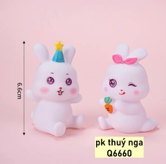 Đôi thỏ trắng kute (NHỰA) (mũ xanh và nơ hồng).