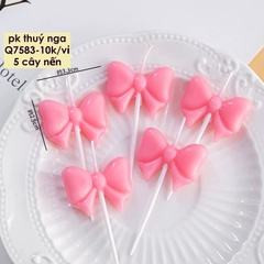 Vỉ 5 cây nến hình nơ màu hồng.