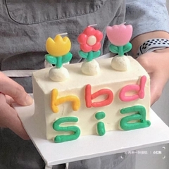 Vỉ nến 3 bông hoa (đỏ-vàng-hồng).