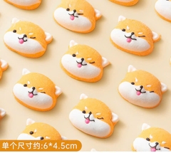 Kẹo đường -mặt chó con màu cam trắng1 gói 100 gam gồm 10 chiếc).