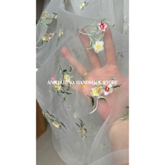 Vải voan kính (SLx0.5m khổ 0.5m) thêu hoa chân bông hai đầu.