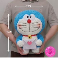 Doraemon cầm bao thư nhồi bông mềm mịn 40cm siêu dễ thương