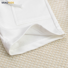 Quần đùi trắng bé trai cotton co giãn có túi thun mềm mát đi học chơi