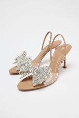 SANDALS WITH OVERSIZED SHINY BOW