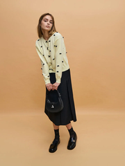 Trice Metallic Accent Belted Curved Shoulder Bag