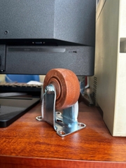 Bánh xe chịu nhiệt màu nâu phi 75 cố định