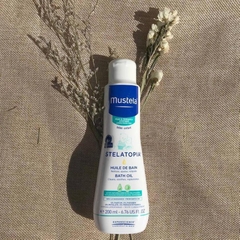 Dầu Tắm Gội Da Chàm Thể Tạng (Viêm Da Cơ Địa) Mustela Stelatopia Bath Oil 200ml