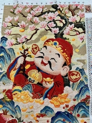 Tranh thành phẩm Thần tài, kích thước 50 x 67 cm, đã thêu thành phẩm