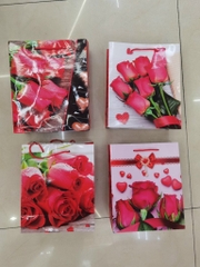 Túi quà giấy có quai xách hình hoa hồng (4 mẫu) 18*21*8 (1T*100B*12C) - Mã 2