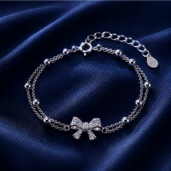Vòng tay nơ đôi bi tròn – Dịu dàng được giữ cân bằng | Hải Hà Jewelry