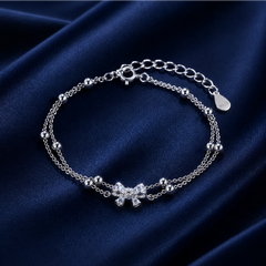 Vòng tay nơ đôi bi tròn – Dịu dàng được giữ cân bằng | Hải Hà Jewelry