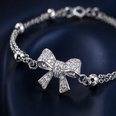 Vòng tay nơ đôi bi tròn – Dịu dàng được giữ cân bằng | Hải Hà Jewelry