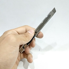 Dao rọc giấy Deli E2058