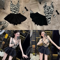 Sét đồ nữ hotrend áo bodysuit vằn ngựa khoét lỗ mix chân váy xòe