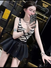 Sét đồ nữ hotrend áo bodysuit vằn ngựa khoét lỗ mix chân váy xòe chất liệu thun mềm mại và mango phong cách hiện đại