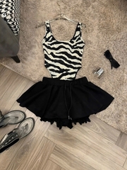 Sét đồ nữ hotrend áo bodysuit vằn ngựa khoét lỗ mix chân váy xòe chất liệu thun mềm mại và mango phong cách hiện đại