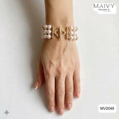 MV2046 - Lắc tay 3 sợi trai trắng mix charm.