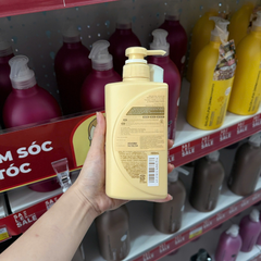 Dầu xả Tsubaki Premium Repair ngăn ngừa rụng tóc chai 490ml - màu vàng
