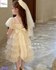 Đầm tiệc kem tầng đính nơ