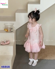 Đầm cam đính nơ trái tim