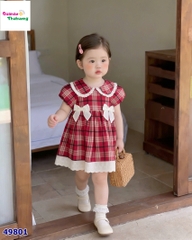 Đầm caro đỏ nơ trắng