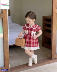Đầm caro đỏ nơ trắng