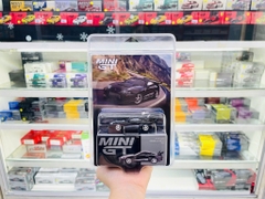 Xe Mô Hình Toyota Supra VeilSide Combat V-II Black LHD /Blister Packaging 1:64 MiniGT - CARD