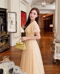 VT ren be cộc tay đính 2 tag hoa tròn