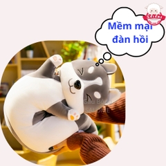 Gấu bông chó xám giơ tay
